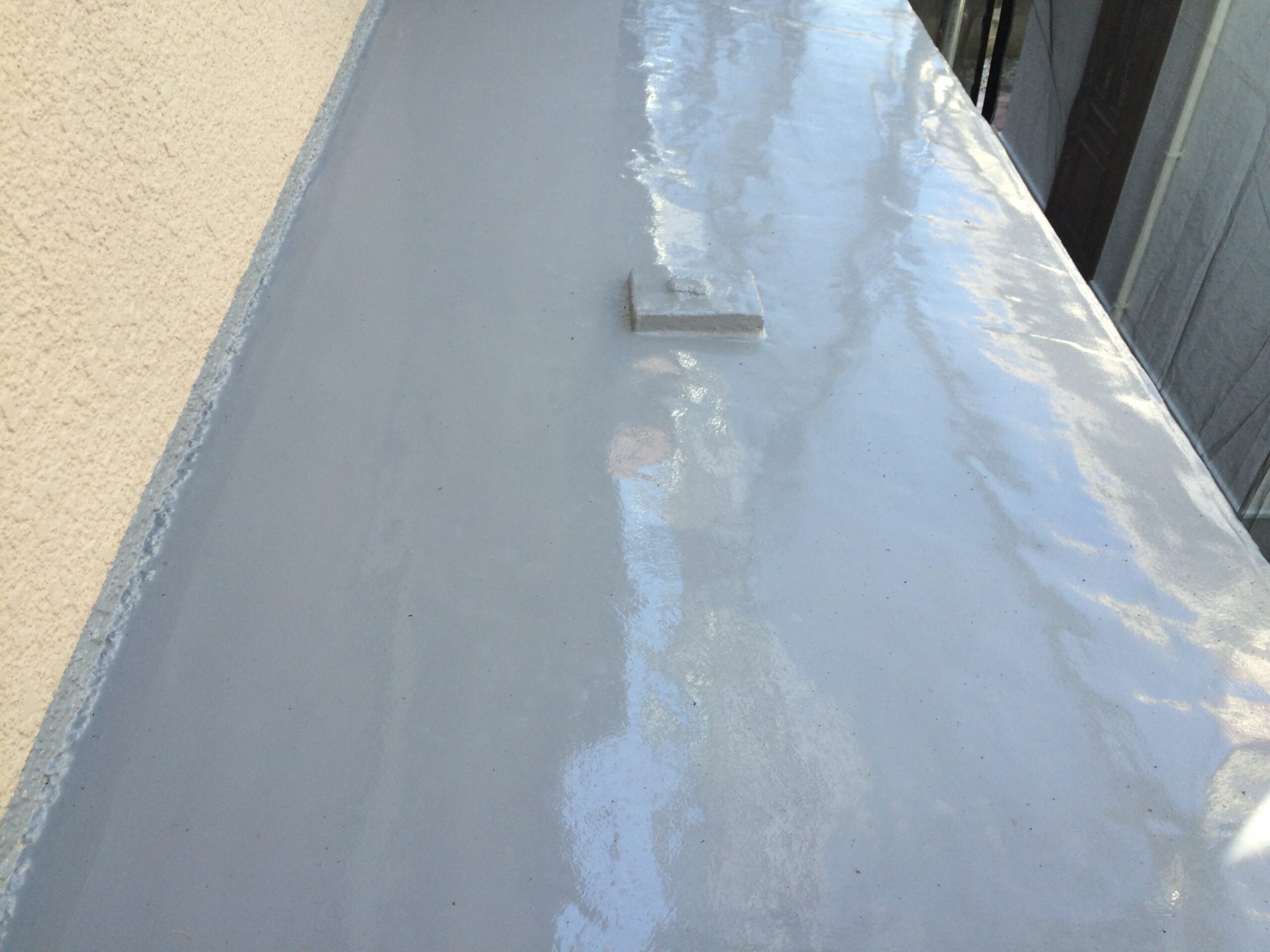 通気緩衝工法を用いた防水工事が竣工したルーフバルコニーの外観