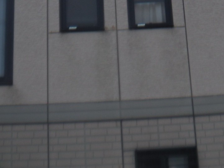 塗装自体はかなり劣化している外壁