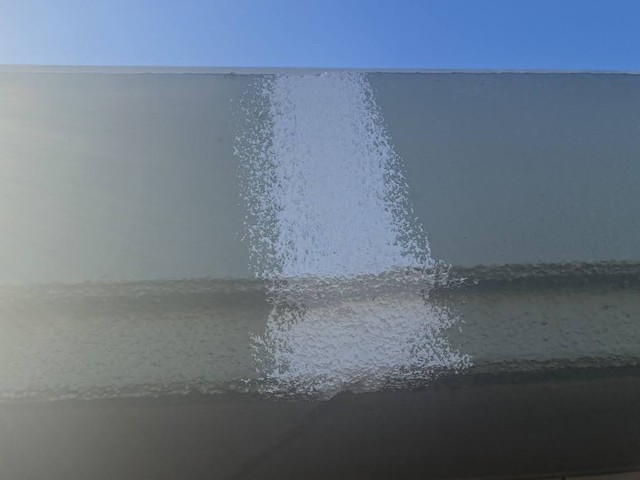 筑西市　モルタル化粧帯塗装　ゆず肌模様の下塗りの写真