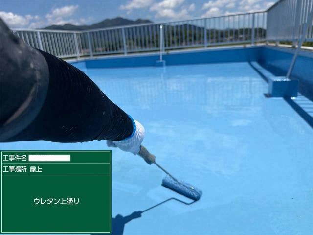 仕上げ塗布の様子