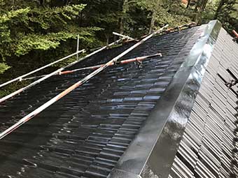 屋根上塗り吹き付け
