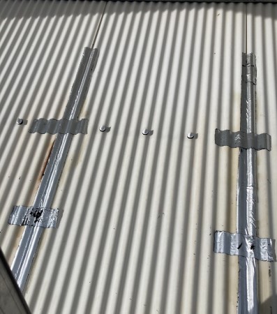 防水テープで波板飛散予防