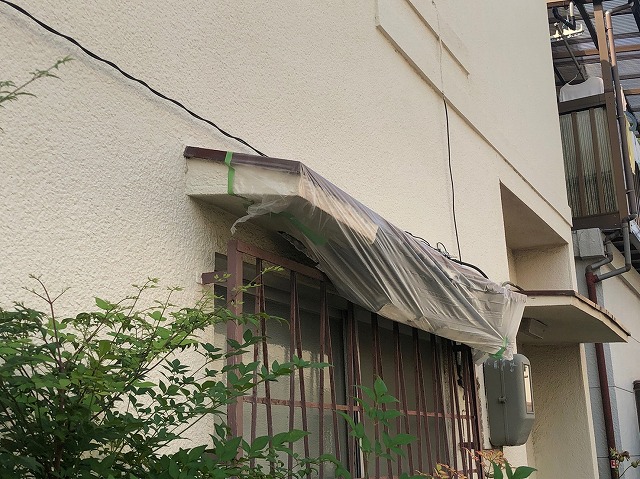 庇のモルタル落下