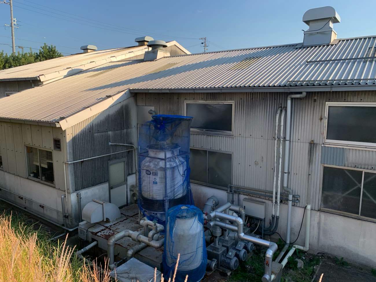 波型スレート外壁のメンテナンスを行う名古屋市天白区の工場