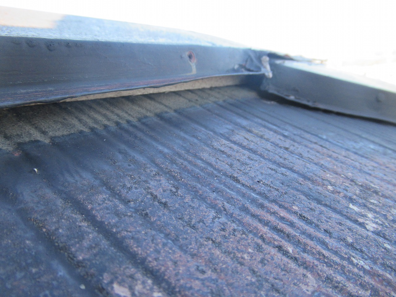 韮崎市棟板金破損