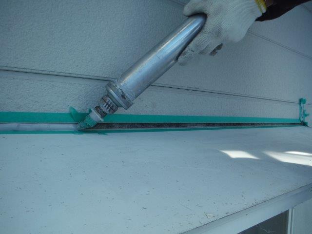 岸和田市下松町の庇の取り合いにシーリング充填