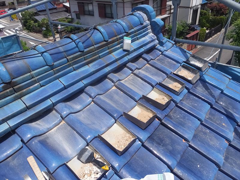 既設漆喰の撤去中の写真