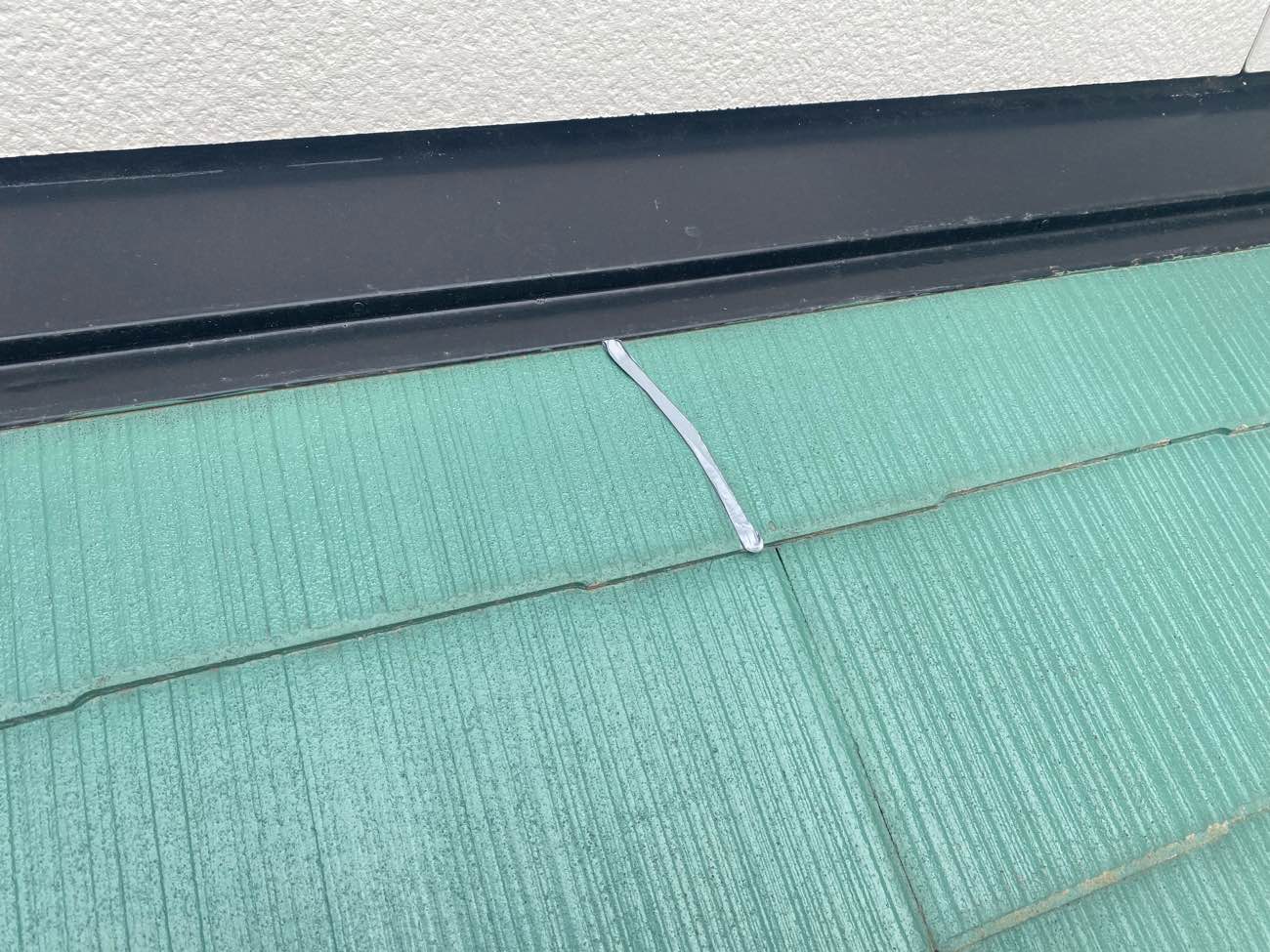 春日市物件のスレート屋根の補修工事