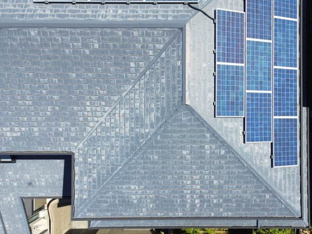 大野城市の劣化したコロニアル屋根