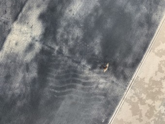 四日市市にて中古物件の増築部分の雨漏れ点検のシート防水の状態の写真