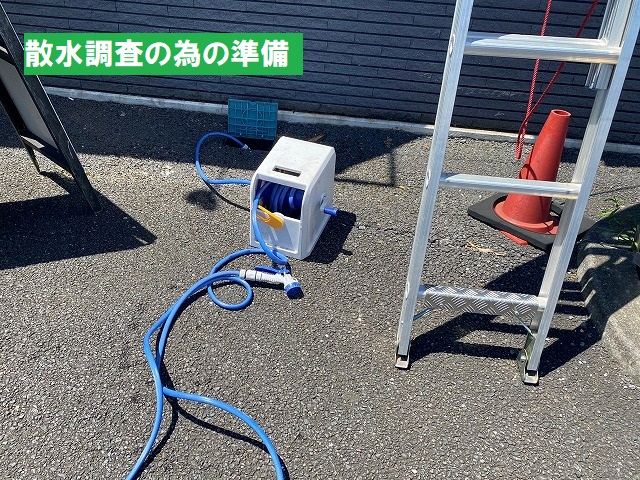 散水栓にドラム式の延長ホースを接続