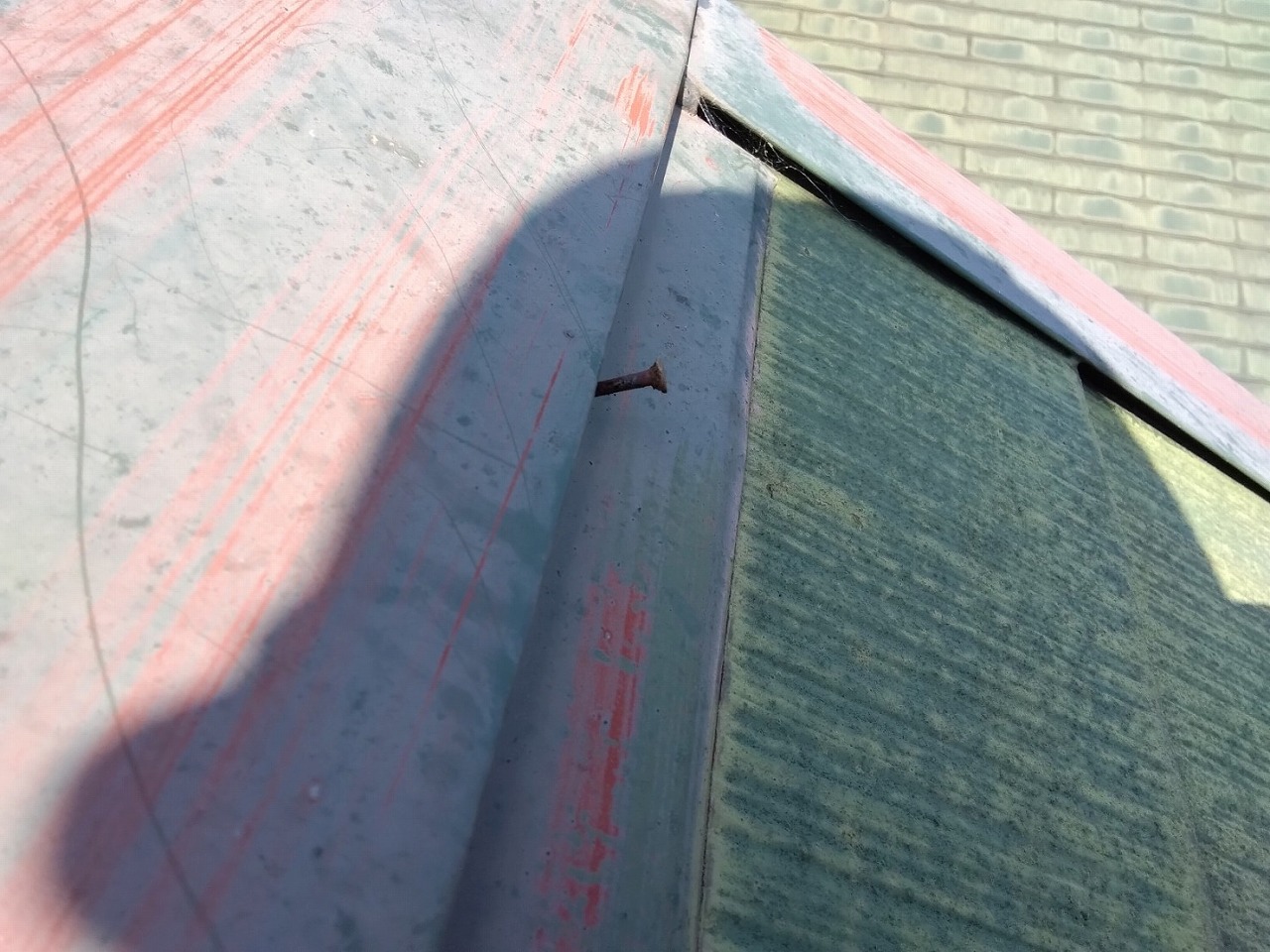 棟包み　釘浮き