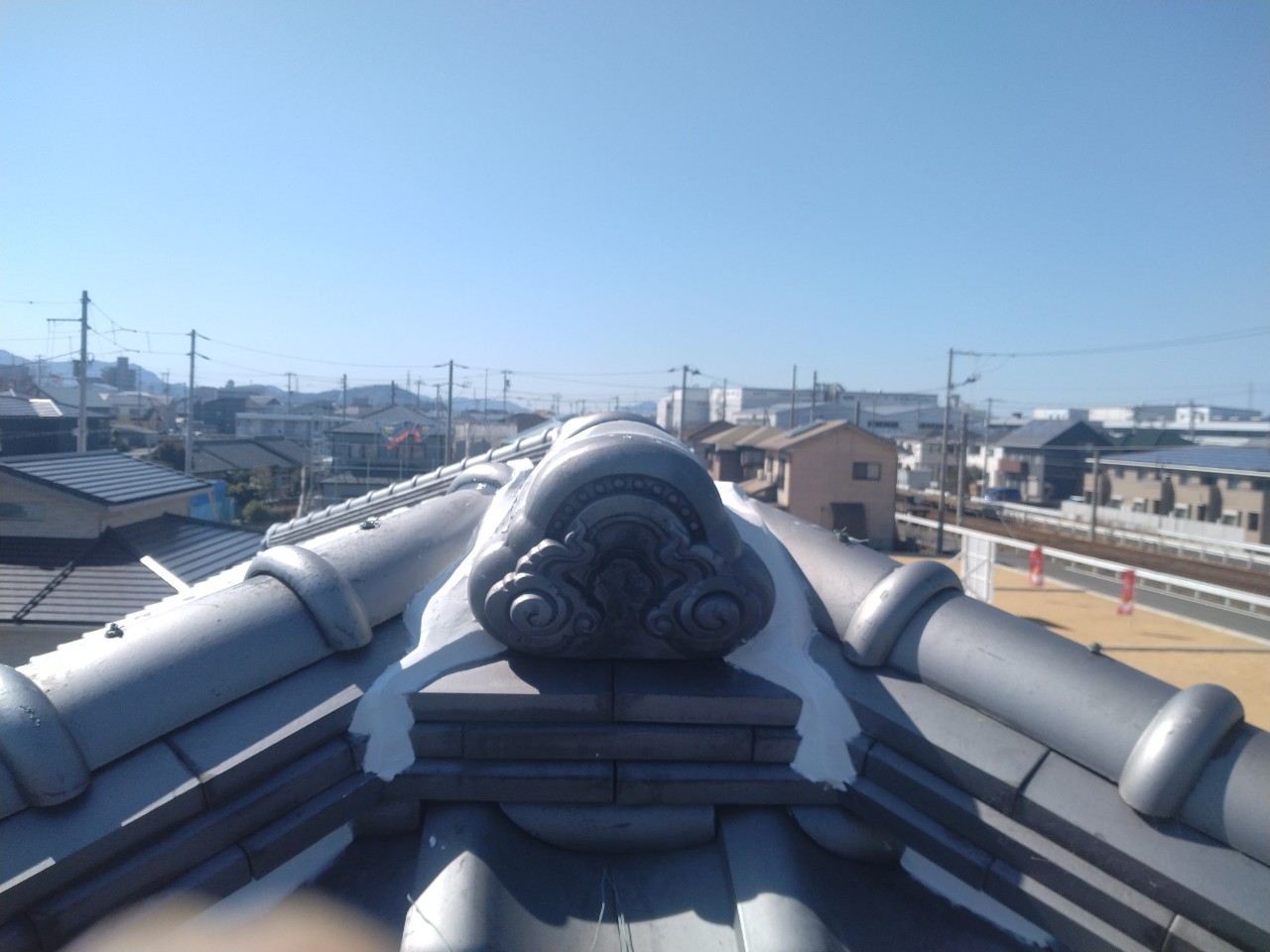 丸亀市　屋根の鬼瓦部分の漆喰施工